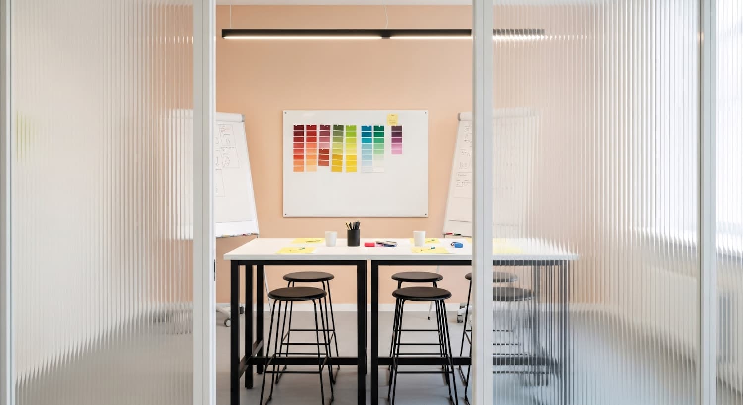 Project meeting room with drawings and materials